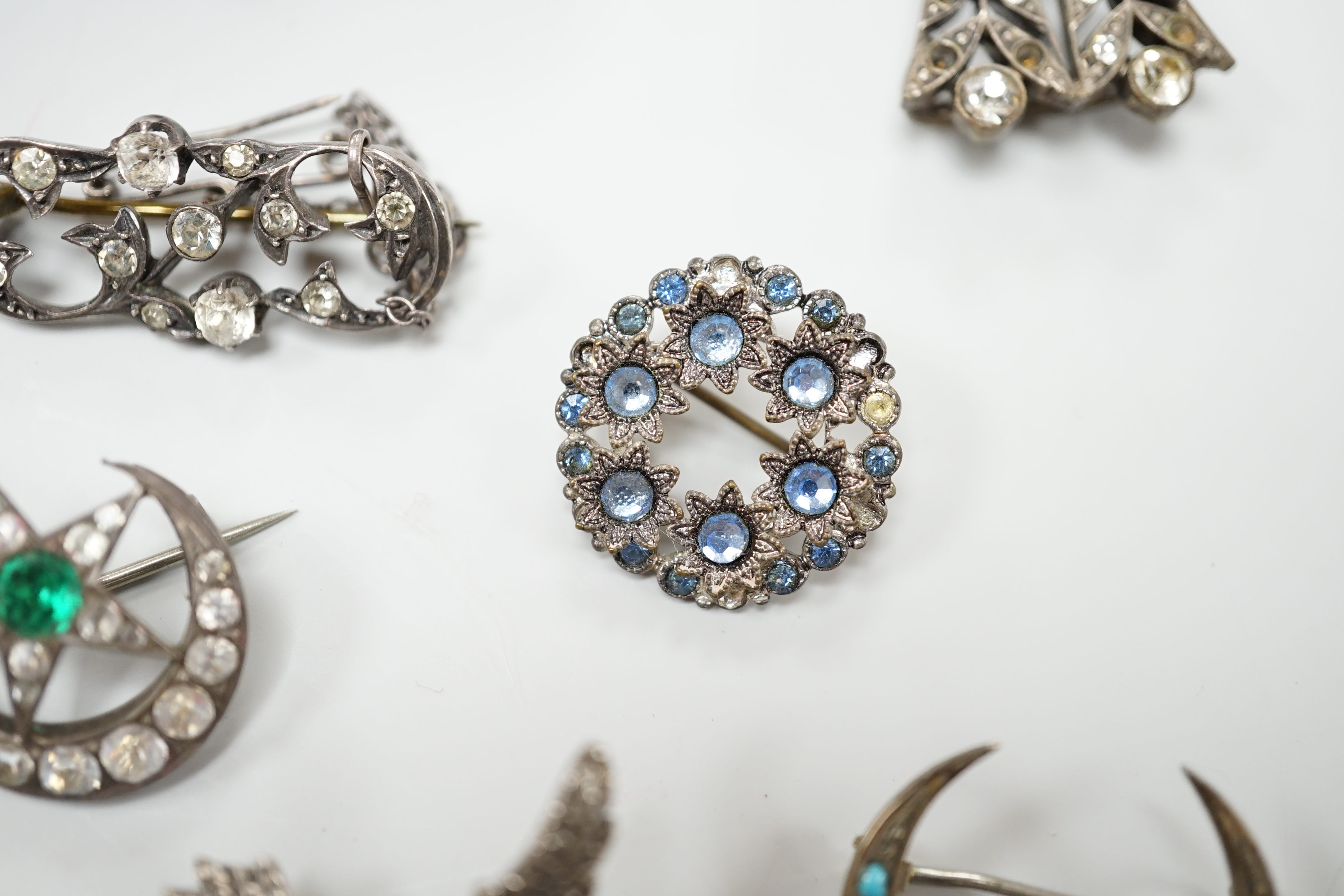 A group of mainly paste set jewellery including a pair of 9ct gold, silver and paste drop earrings and an opal set constellation brooch